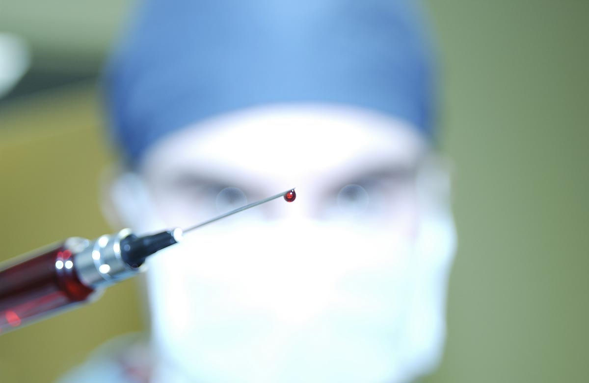 Close-Up-Blood-Drip-Syringe-Doctor