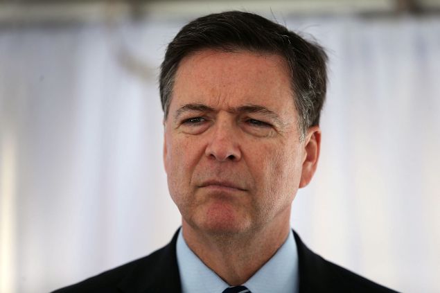 MIRAMAR, FLORIDA - APRIL 11:  FBI Director James Comey speaks to the media after holding a ceremony to commemorate a shoot-out thirty years after, FBI agents Ben Grogan and Jerry Dove died in a gun battle with two heavily armed suspected bank robbers in Miami-Dade county on April 11, 2016 in Miramar, Florida. The shootout left five other agents wounded and the two serial bank robbers were killed by one of the wounded FBI agents.  (Photo by Joe Raedle/Getty Images)