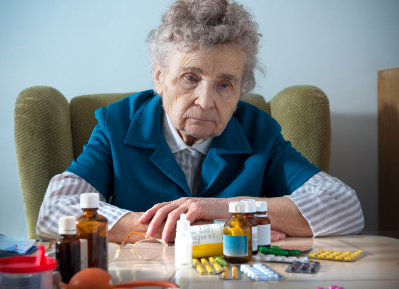 Senior-Elderly-Woman-Drugs-Prescription-Pills-Sad